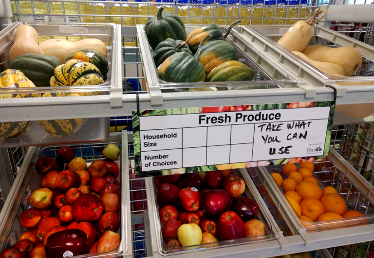 Produce on display at a food shelf working with FFEN. FFEN recommends that at least half of all foods offered should be fresh ones, from produce to meat and dairy.