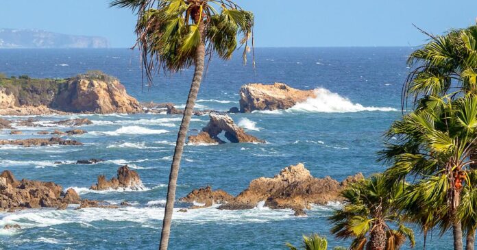 Person rescued after SUV found in ocean off Orange County shore