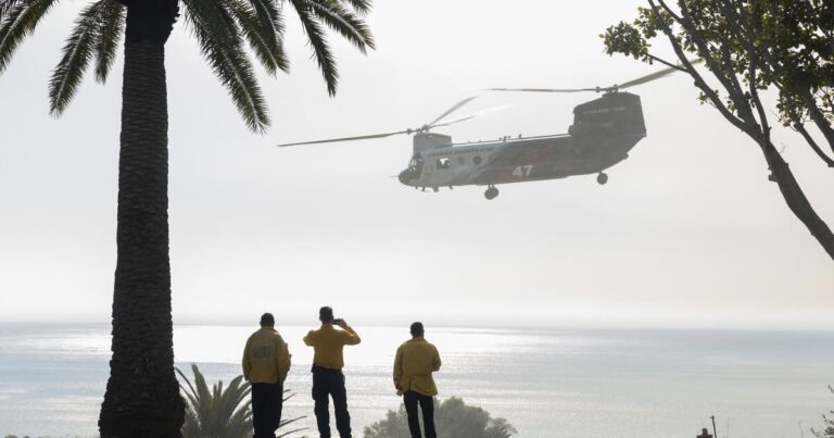 Raging Malibu fire burned to the Pacific Ocean but spared some homes