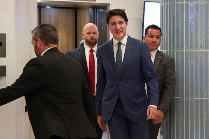 Canada’s Prime Minister Justin Trudeau leaving a hotel in West Palm Beach en route to meet President-elect Donald Trump at Mar-a-Lago in Palm Beach, Florida, on November 29.